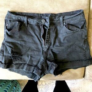 Black jean shorts with distressing